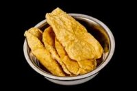 Papadum (Plain or spicy wafer thin fried crisp)